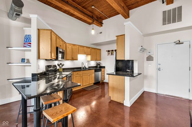 Open floor plan flows from the front door, kitchen, eating & living areas | Image 8