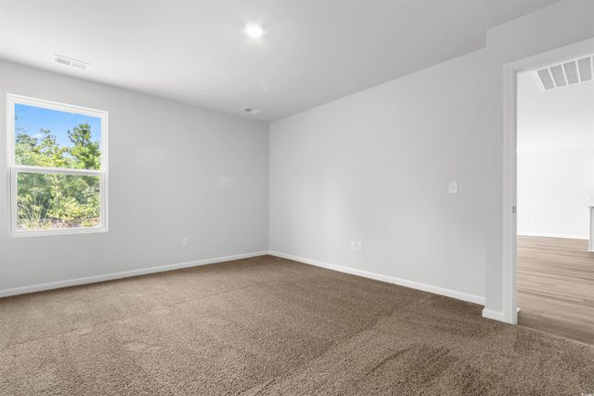 Spare room with carpet floors | Image 27