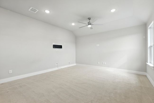 Bonus room with a ceiling fan, recessed lighting, and lofted ceiling | Image 13