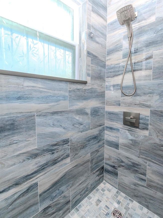 2ND BATHROOM/WITH NEW WALK IN SHOWER AND FLOOR TO CEILING TILE. | Image 44