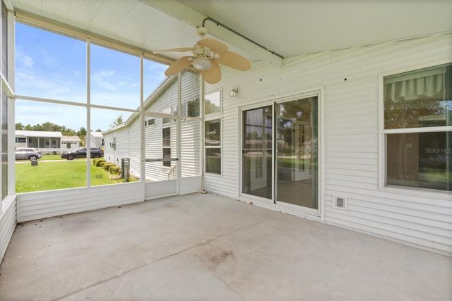 Screened Porch on Back Side of Home off the Large Airconditioned Florida Room | Image 24