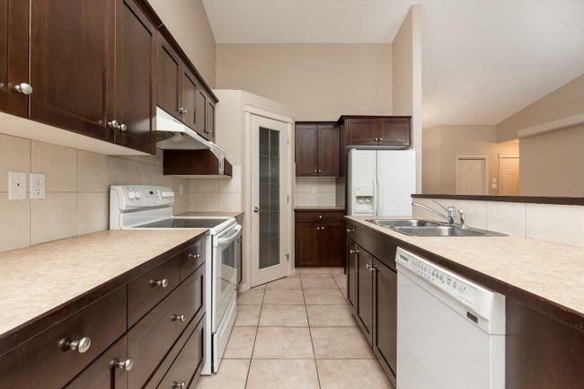 13 - 240 Heritage Boulevard W, Home with 3 bedrooms, 2 bathrooms and 2 parking in Lethbridge AB | Image 6