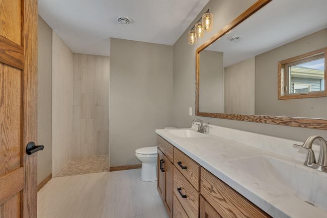 "roll in" tile shower | Image 13