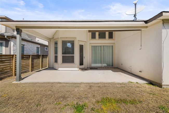 Backyard with ample space for BBQ grill and outdoor seating | Image 35