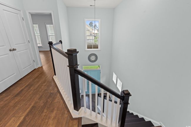 Stairs featuring high ceiling entryway. | Image 5