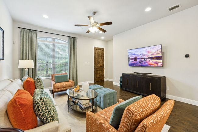 Living room featuring wood finished floors, ceiling fan, and recessed lighting | Image 9