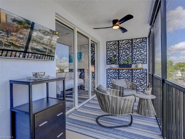 SCREENED LANAI. ENTRANCE TO OWNER'S SUITE SHOWN AT LEFT. | Image 20