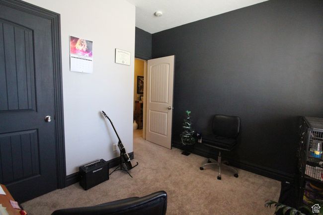 Carpeted office with baseboards | Image 12