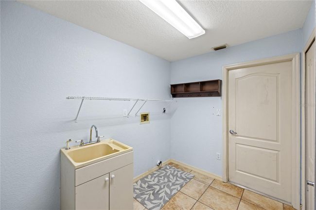 12950 Sw Pembroke Cir S, House other with 3 bedrooms, 2 bathrooms and null parking in LAKE SUZY FL | Image 22
