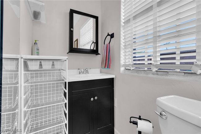 full bath featuring toilet and vanity | Image 21
