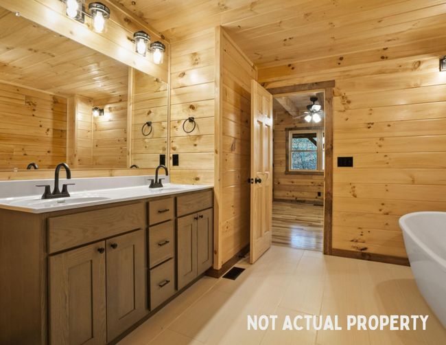 On main floor with soaking tub and shower | Image 35