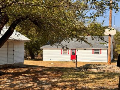 front of home with detached garage | Image 2