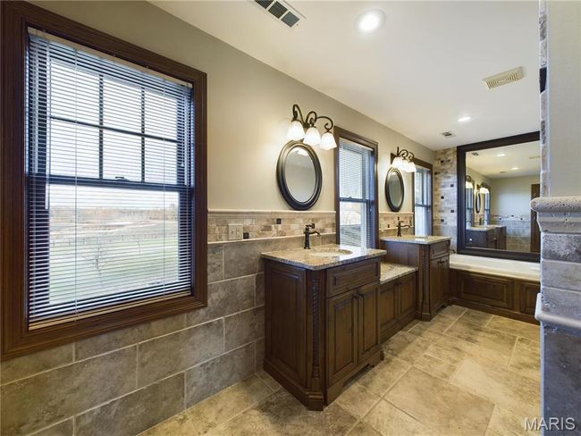 15877 Highway M, Home with 8 bedrooms, 4 bathrooms and 3 parking in Bloomfield MO | Image 49