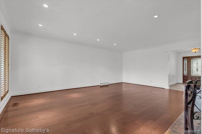 Family Room with Wood-Burning Fireplace | Image 9