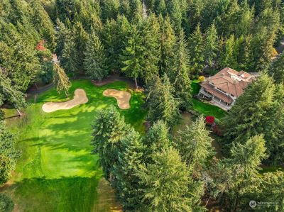 Nestled on a cul-de-sac, this home offers panoramic views of the the golf course. | Image 2