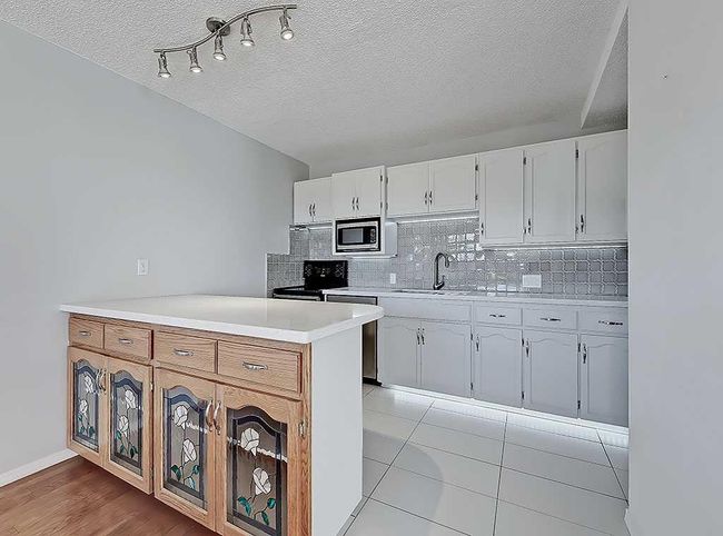 100 - 524 Cedar Crescent Sw, Condo with 2 bedrooms, 1 bathrooms and 1 parking in Calgary AB | Image 19