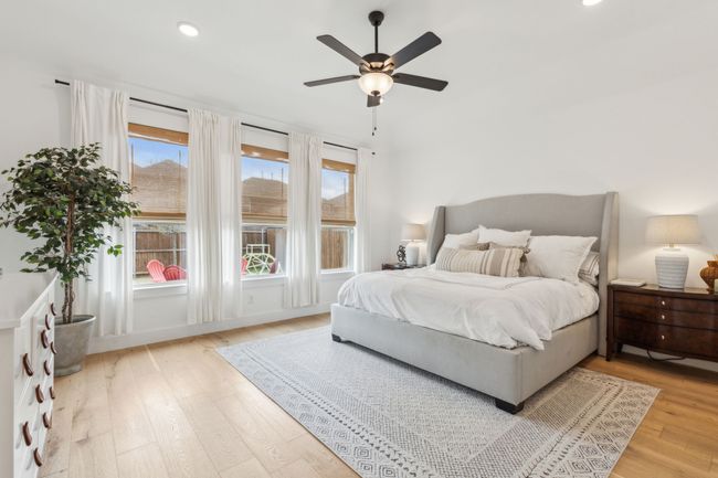 Large primary bedroom is split from other bedrooms for added peace and privacy | Image 12