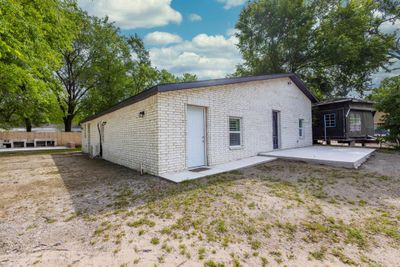 Back of house featuring a patio area | Image 1