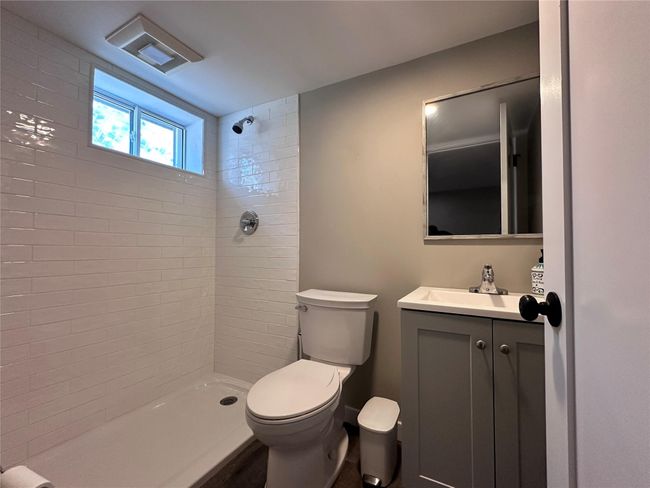 Full bath with vanity and a tile shower | Image 13