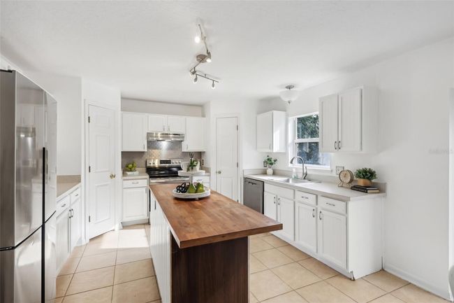 Kitchen with an island & double pantry's | Image 5