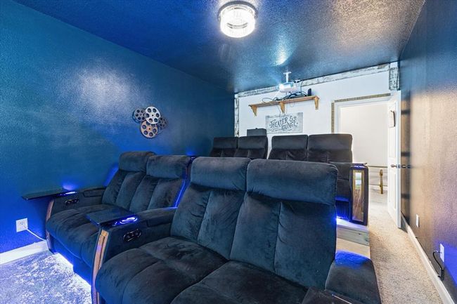 Incredible media room with HD projector, built in seating with SOUNDSHAKERS for the ultimate entertainment experience! | Image 22