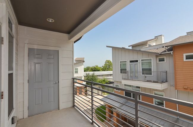 View of balcony which is off the primary bedroom | Image 11