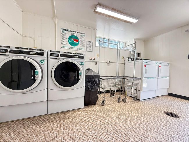 Community laundry with separate washer and dryer | Image 17