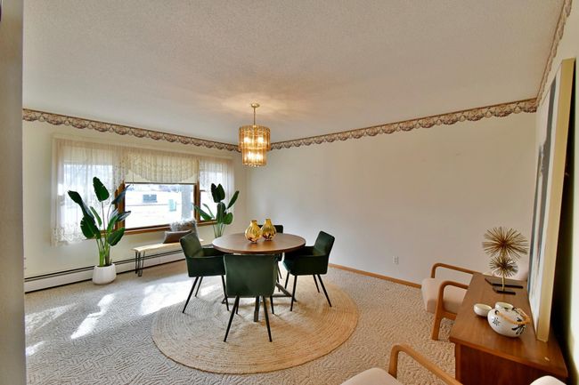 Dining room with view of golf course | Image 10