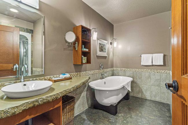 402 - 191 Kananaskis Way, Condo with 3 bedrooms, 3 bathrooms and 1 parking in Canmore AB | Image 30