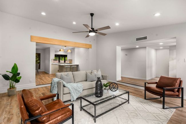 Living room with light wood finished floors, baseboards, ceiling fan, and recessed​​‌​​​​‌​​‌‌​‌‌​​​‌‌​​‌‌​‌​​​​​‌ lighting | Image 7