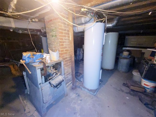 Utility room with electric water heater | Image 15