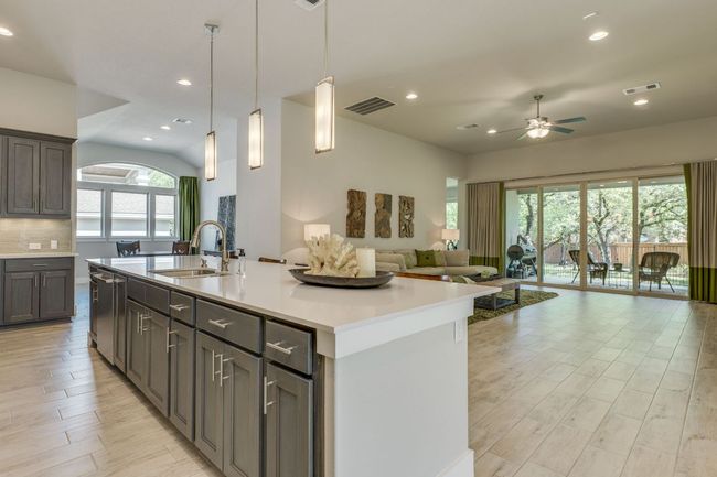 Kitchen overlooks living and dining area | Image 13