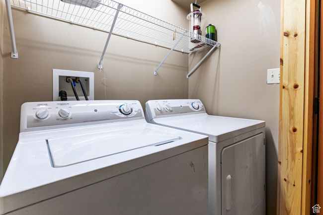 Laundry area with washer and dryer | Image 24