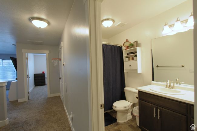 Full bath featuring vanity and a shower with shower curtain | Image 12