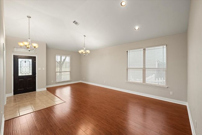 Living room and dining room. | Image 6