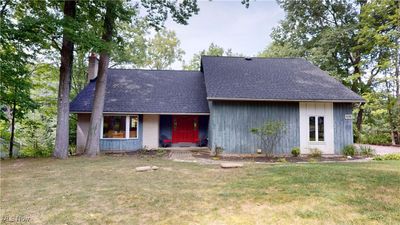 View of front facade with a front lawn | Image 2