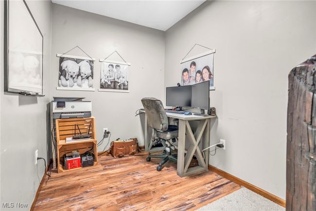 Office featuring wood finished floors and baseboards | Image 22