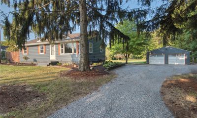 Front of home with large 4 car garage. | Image 2