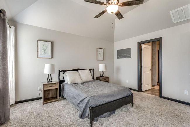 Bedroom featuring baseboards, visible vents, and carpet | Image 25