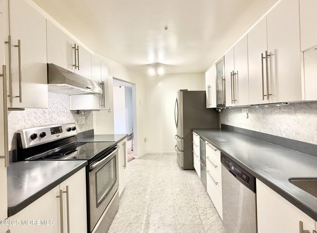 A - 54 Amberly Dr, Home with 2 bedrooms, 1 bathrooms and 1 parking in Manalapan NJ | Image 9