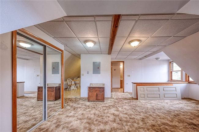 This is the apartment area or a 5th bedroom on the 3rd floor. Perfect for an in-law suite or owners suite! | Image 28