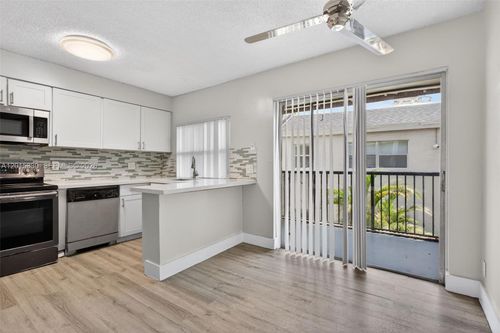 f-4409 Treehouse Ln, Tamarac, FL, 33319-3351 | Card Image
