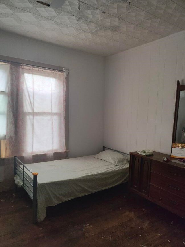 Bedroom featuring hardwood / wood-style floors | Image 16