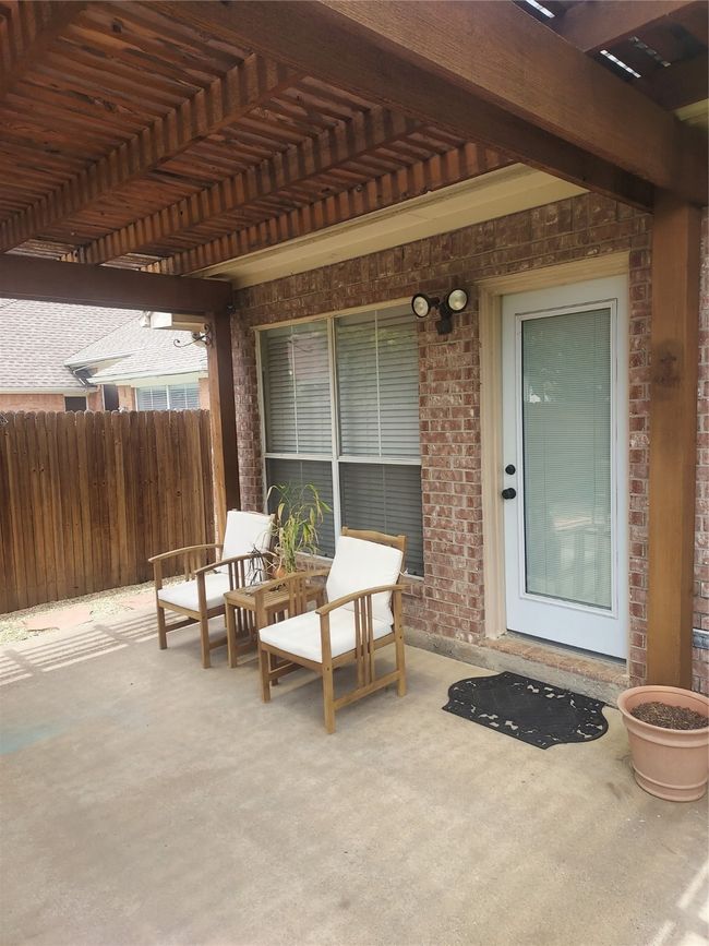 Pergola covered patio. | Image 30