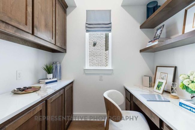 Office area with baseboards and wood finished floors | Image 31