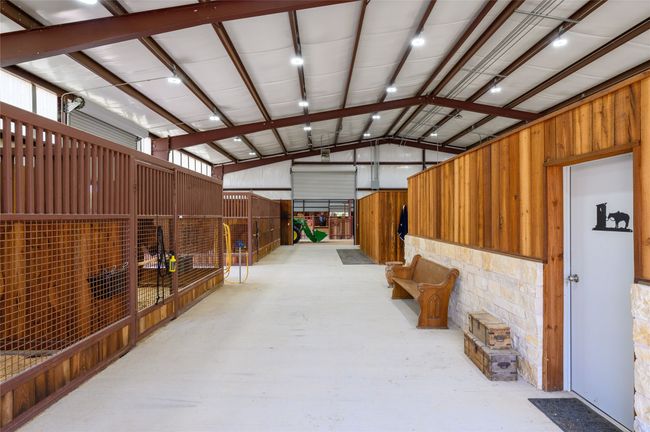 Wide concrete alleys, note beautiful wood and stone finishes | Image 7