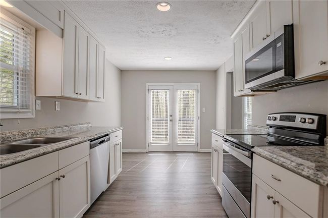 477 Victoria Rd, House other with 3 bedrooms, 2 bathrooms and 4 parking in Woodstock GA | Image 4