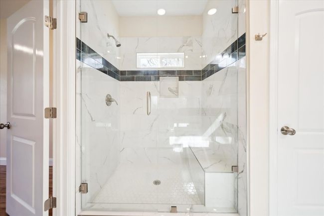 Bathroom with a shower with door | Image 12