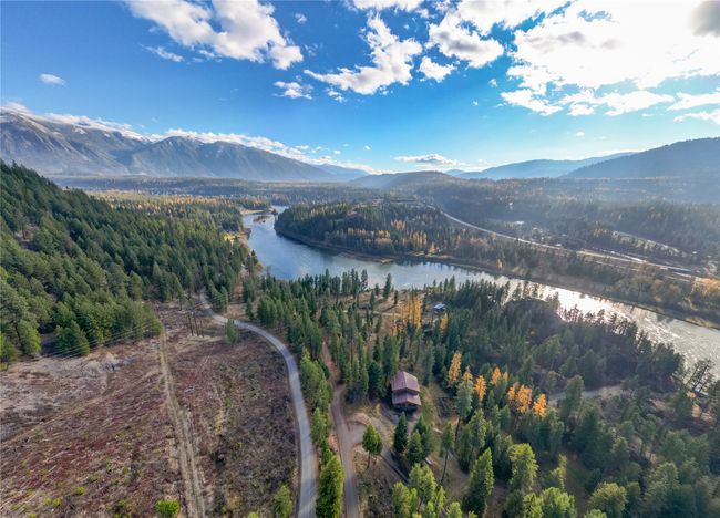 Birds eye view of property featuring a water and mountain view | Image 8