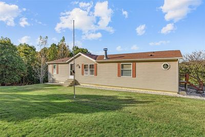 Manufactured / mobile home with a front yard | Image 3